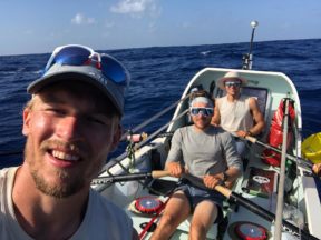 Atlantic rowing trio issue charity challenge from high seas