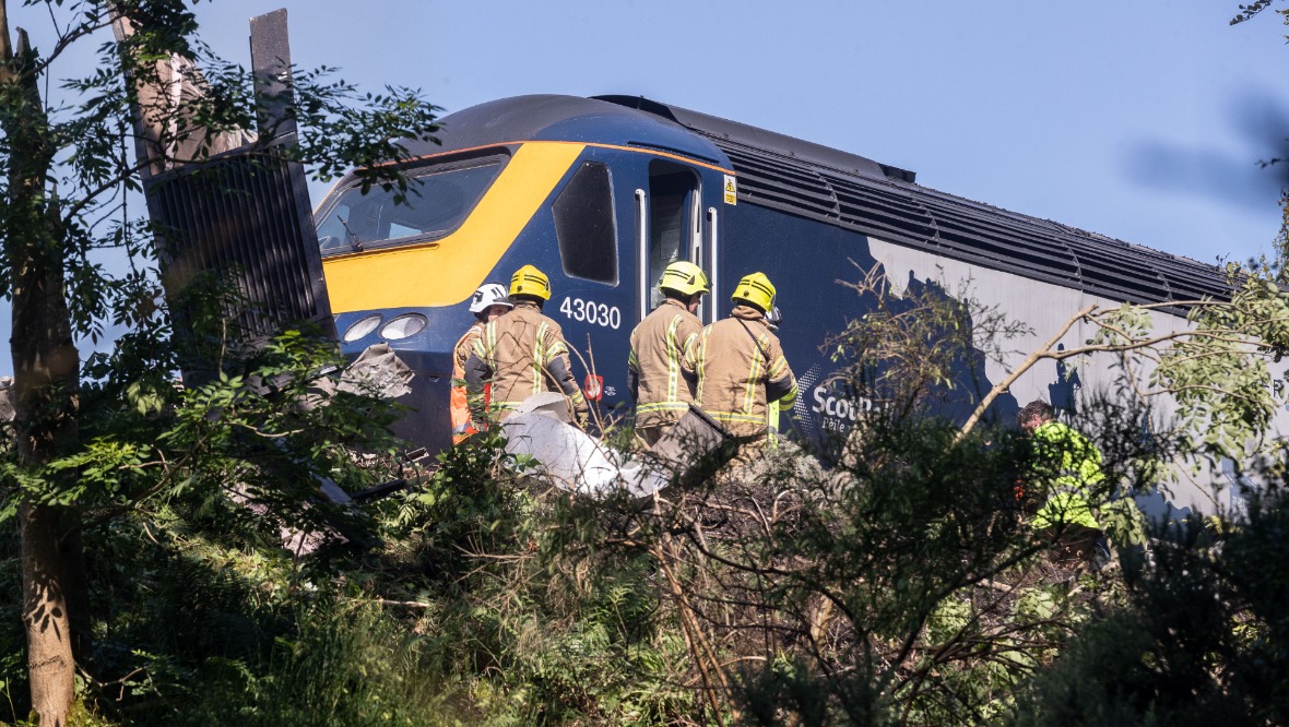 Emergency crews at the scene following the derailment.