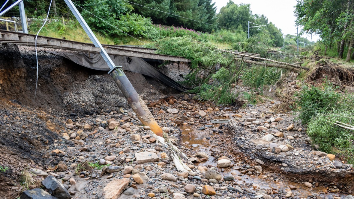 Damage: Sections of the track were completely washed away. <strong>NETWORK RAIL</strong>”/><cite class=cite></cite></div><figcaption aria-hidden=true>Damage: Sections of the track were completely washed away. <strong>NETWORK RAIL</strong> <cite class=hidden></cite></figcaption></figure><p>Over the past five weeks, engineers have been working round-the-clock to completely rebuild the foundations of the line, replacing more than 15,000 tonnes of soil and stone beneath the track.</p><p>A kilometre of new double-track railway has also been laid – consisting of more than 4500m of new rails and 4424 concrete sleepers, along with 10,000 tonnes of new ballast requiring 27 engineering trains.</p><p>More than 3000m of signalling cables have been re-laid and two new twin-track overhead power gantries installed.</p><p>The line reopened on Monday morning.</p><figure class=