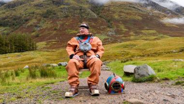 Fundraiser climbs Ben Nevis in deep-sea diving suit