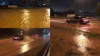 Torrential rain brings travel disruption and flooding