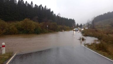 Building collapses and roads closed as winds and rain sweep in