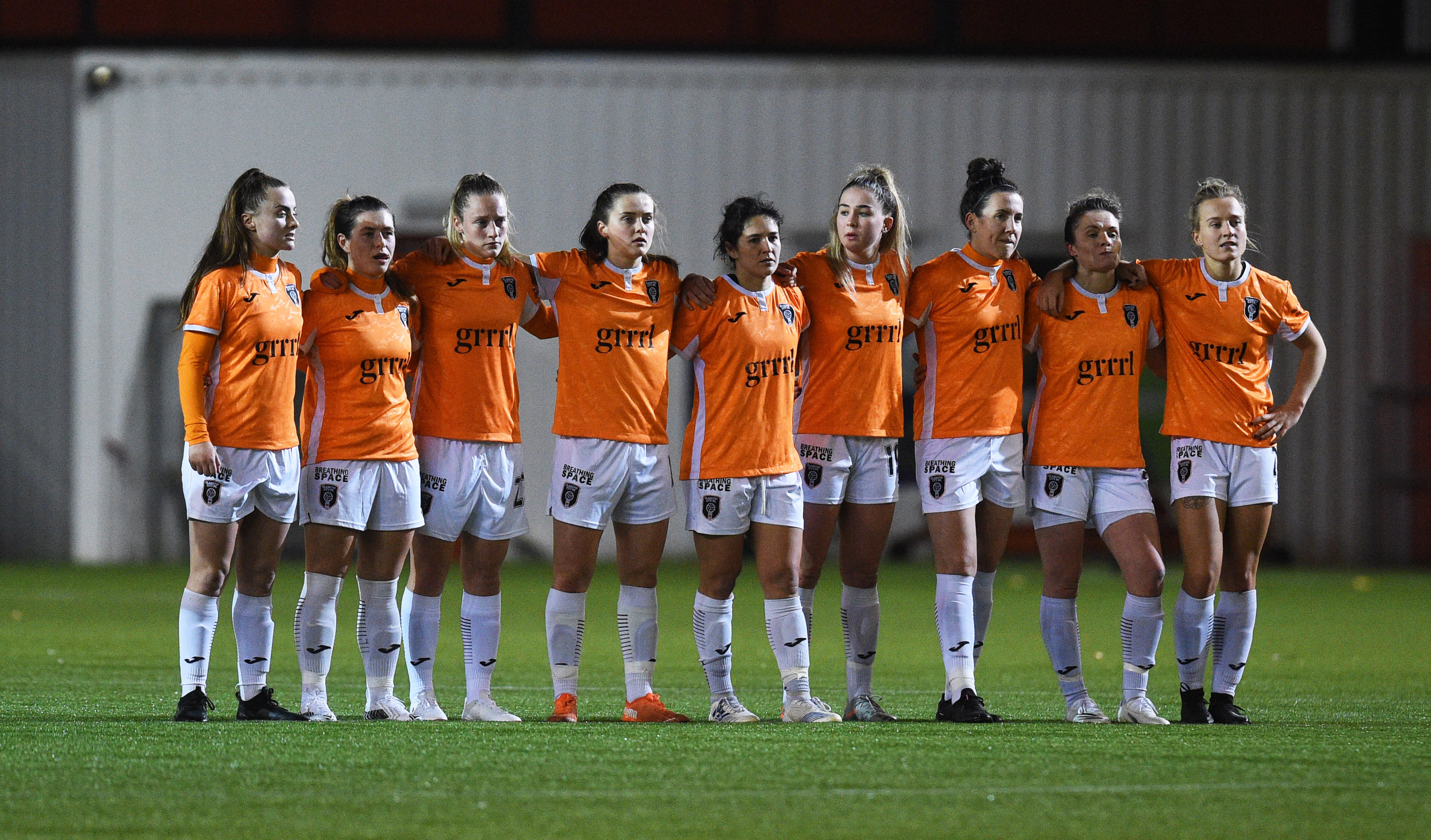 Penalties: Glasgow City players link arms for Champion's League qualifier shootout.