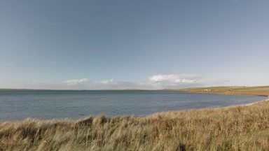 Beach locked down following discovery of human remains