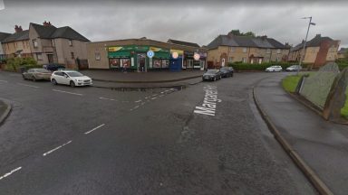 Father and son attacked by group ‘of up to six people’ at shops