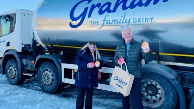 Dairy Queen: Free milk for woman who pushed lorry up hill