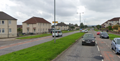 Taxi driver threatened with knife while parked on busy road