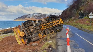 Driver left ‘shaken’ after gritter overturns on black ice