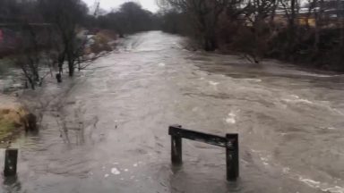 River bursts banks as flood alerts in place across Scotland