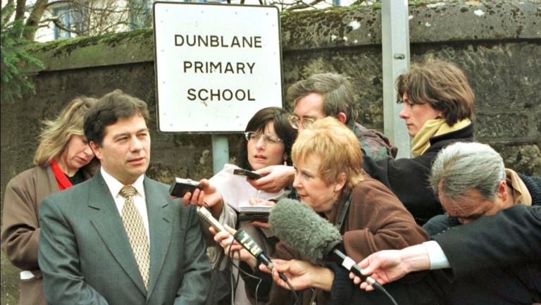 Ron Taylor: Head teacher addresses the press. 