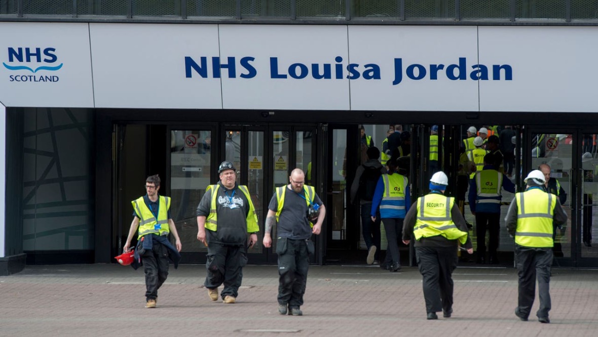 Glasgow: Workers outside the temporary NHS Louisa Jordan Hospital.