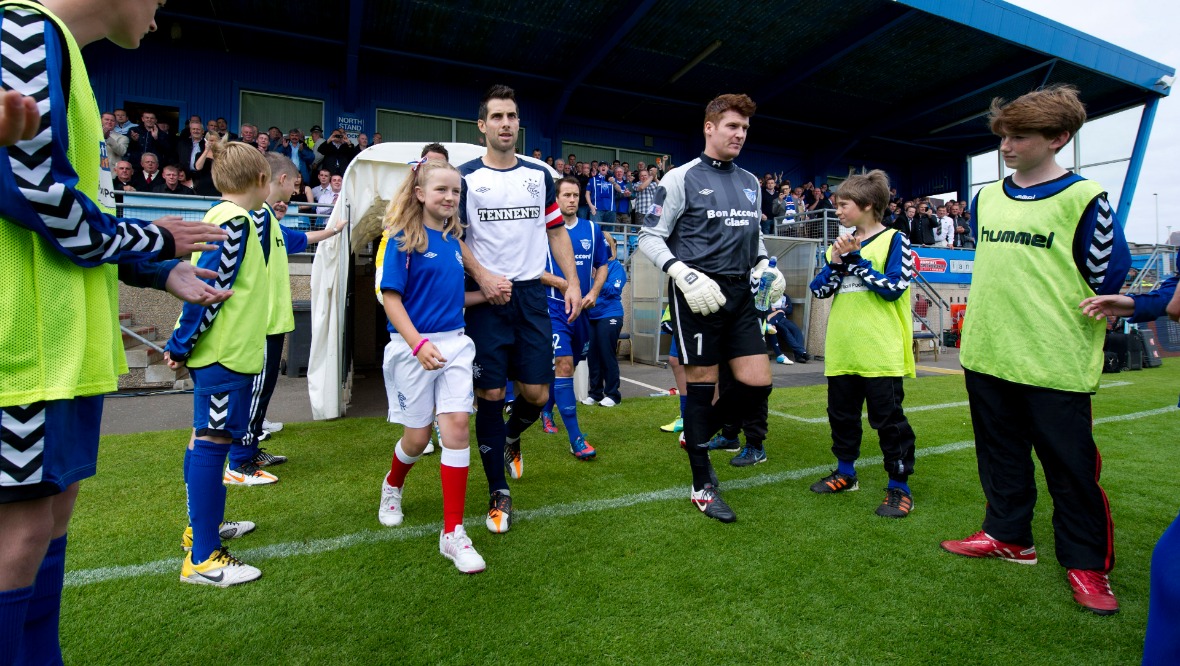 Rangers walk out for their first Third Division match at Peterhead in 2012.