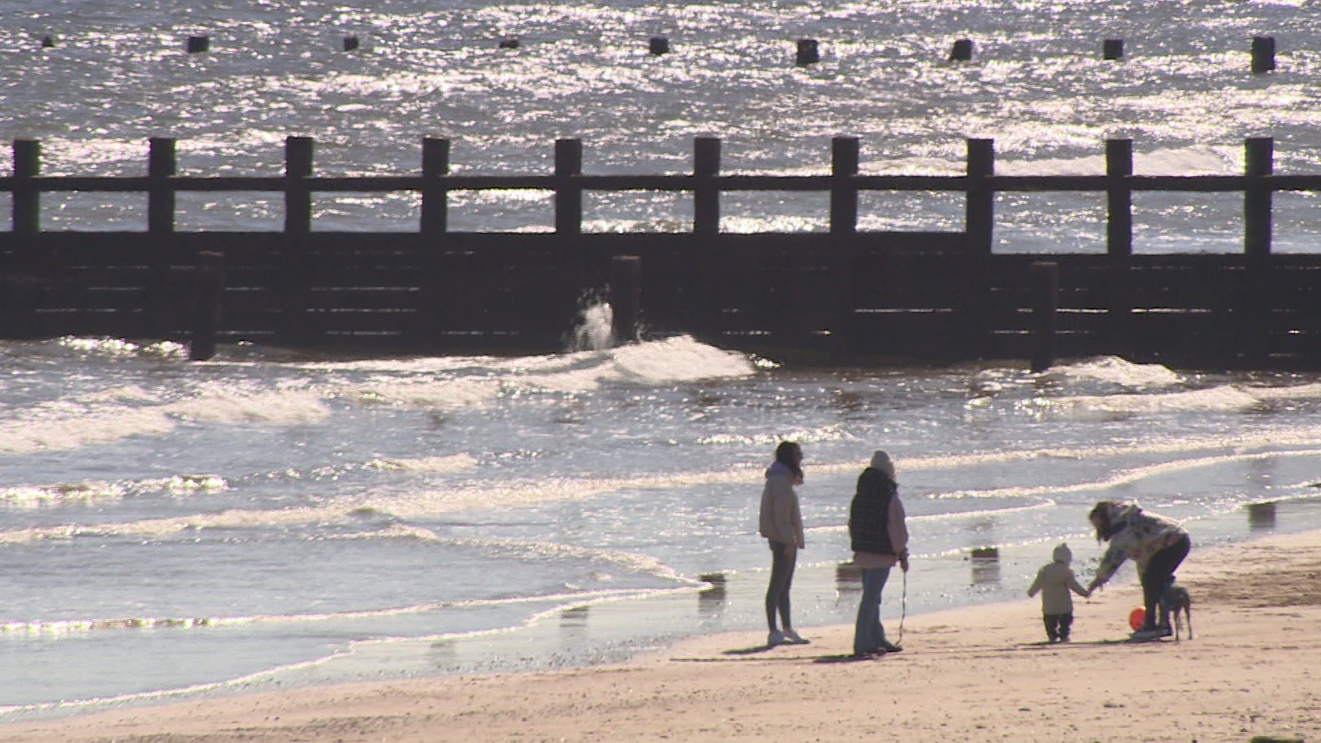 People enjoying the sun and sand in Aberdeen on Friday, April 16.