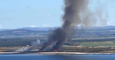 Emergency services tackle huge wildfire near army barracks