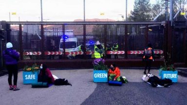 Climate activists blockade Faslane nuclear base with plant pots