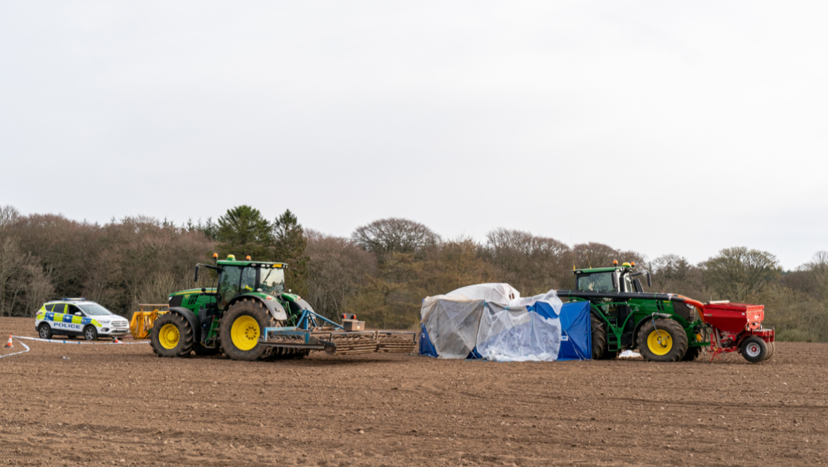 Woman found dead in field following incident on farm