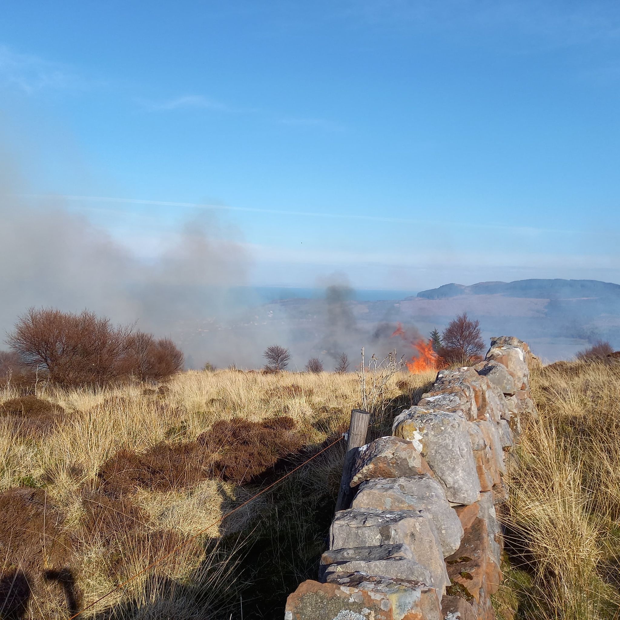 Fire burning in Glen Cloy, Arran (Christian Roots)