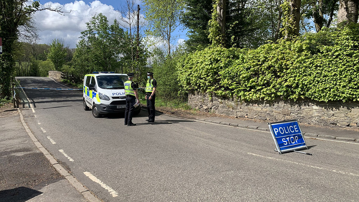 Police near scene of explosion at Celtic chief executive Peter Lawwell's house.