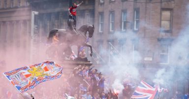 Five police injured and 28 arrested after Rangers title party