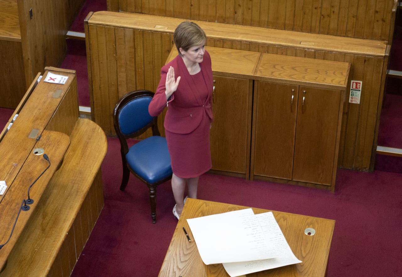Nicola Sturgeon during the swearing in ceremony (Jane Barlow/PA)<br>”/><cite class=cite></cite></div><figcaption aria-hidden=true>Nicola Sturgeon during the swearing in ceremony (Jane Barlow/PA)<br> <cite class=hidden></cite></figcaption></figure><p>“The court acknowledges the difficult choices which you and your Government have been faced with in dealing with Covid-19. It has adapted its processes according to statute and guidance.</p><p>“The courts and tribunals have continued to operate but in a radically different way, as the strange sparsity of this important public ceremony attests.</p><p>“Great strides had been made prior to the pandemic in improving the quality and efficacy of justice.</p><p>“The regrowth of a substantial backlog during a period of enforced adaptation has been unfortunately inevitable.</p><p>“The Scottish Courts and Tribunals Service will engage constructively and imaginatively in developing policy to prevent a return to unacceptable delays in resolving disputes and bringing prosecutions to trial.”</p><div class=
