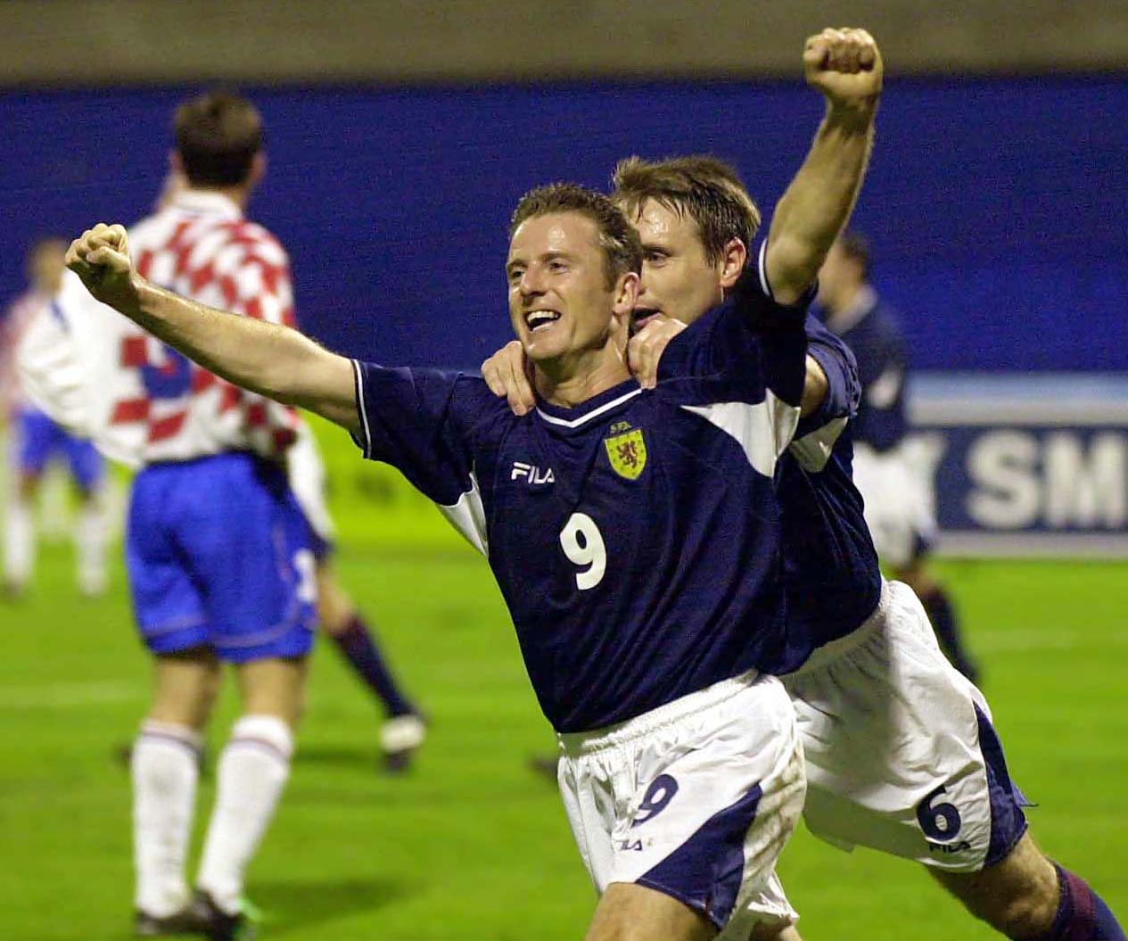 Kevin Gallacher celebrates his equaliser in Zagreb.