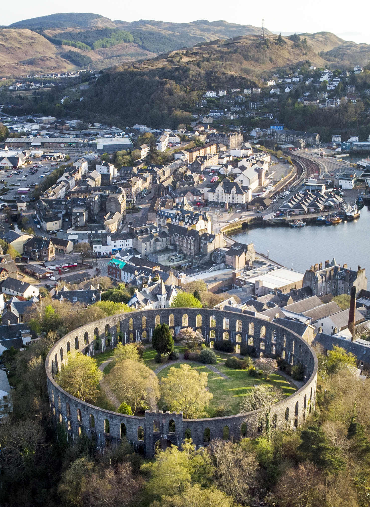 <em>McCaig’s Tower overlooking the town of Oban (Jane Barlow/PA)</em>” /><cite class=