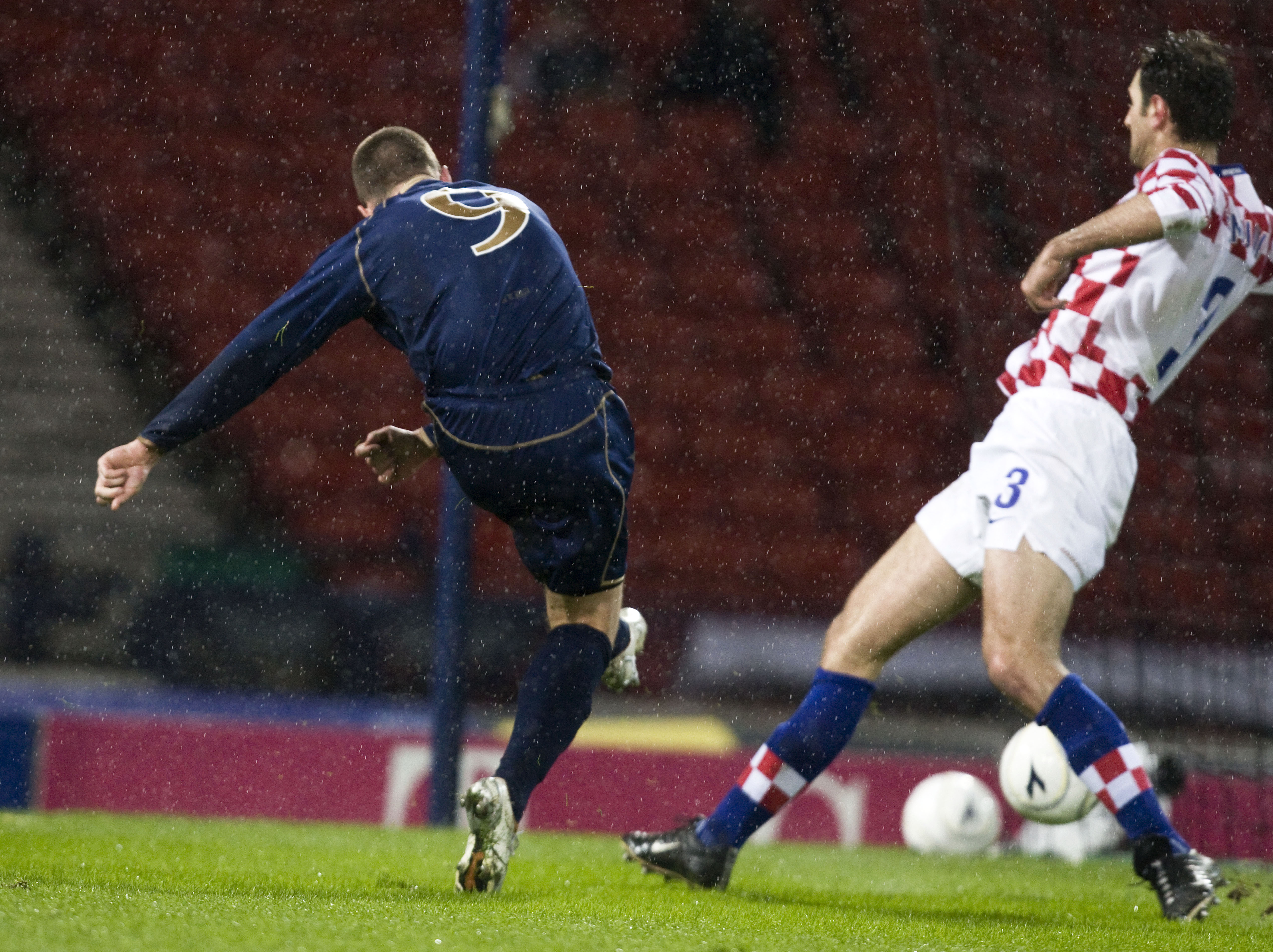 Kenny Miller fires Scotland level in George Burley's first game as manager.