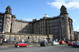 Woman taken to hospital after being struck by bus near Glasgow Royal Infirmary