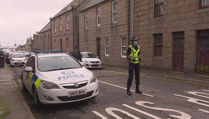 Man dies and another injured after falling from scaffolding