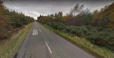 Police seal off road following three-vehicle crash