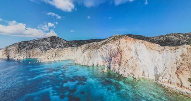 Eighteen rescued after British-flagged ship sinks off Greek island