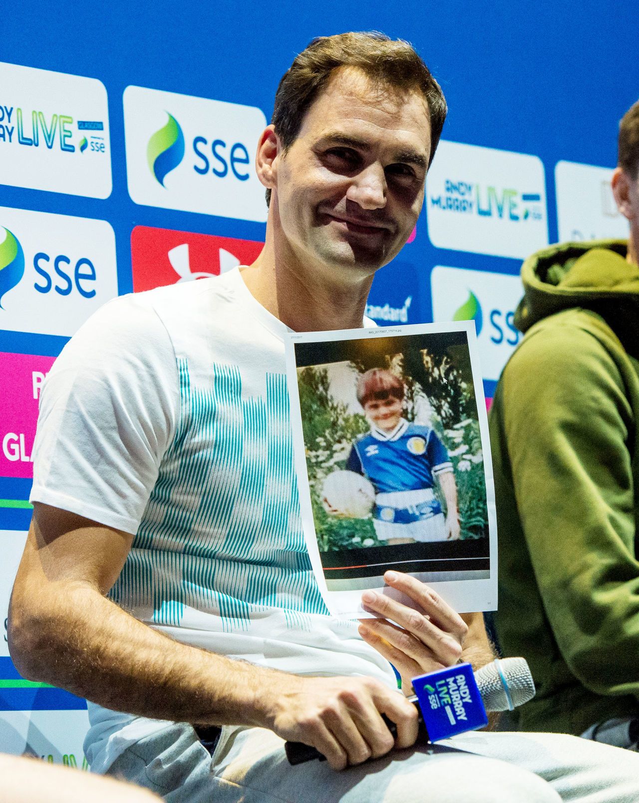 Pre-match, Federer revealed a picture of his younger self, kitted out in a Scotland strip.