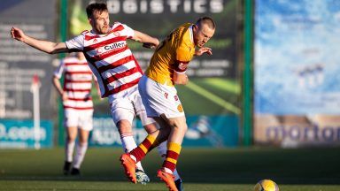 Dundee United sign Scott McMann as Jamie Robson leaves club