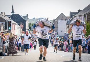 Feel the burn: Coal carrying championship returns to village