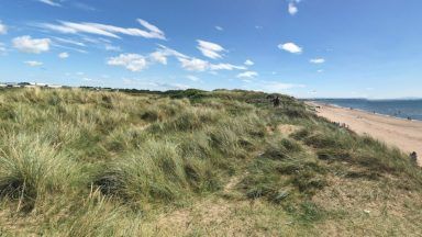 Teenage boy, 15, taken to hospital following serious assault near sand dunes at Irvine Beach Park