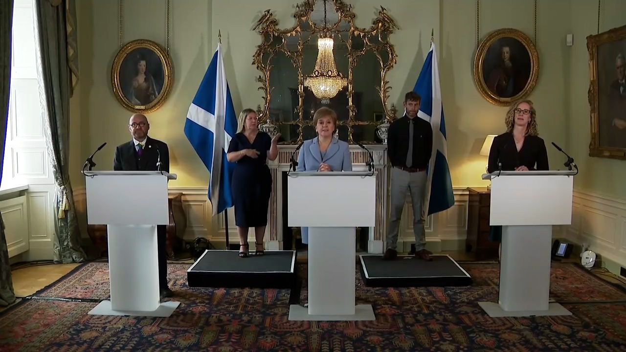 First Minister Nicola Sturgeon flanked by Green co-leaders Patrick Harvie and Lorna Slater.