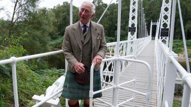 Getting into lycra is hard bit, Charles jokes with cyclists on visit