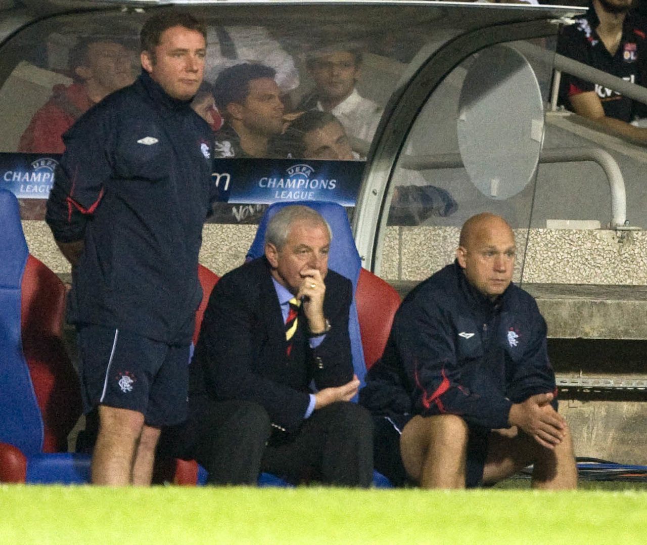 Walter Smith watches the action with assistants Ally McCoist and Kenny McDowall.
