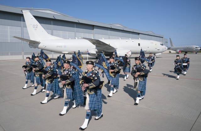 The RAF Lossiemouth Pipes and Drums take part in the ceremony (Jane Barlow/PA)