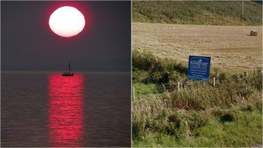 Photographer captures boat basking in red glow of setting sun