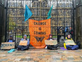 Activists pour ‘oil’ and chain themselves to gates ahead of COP26