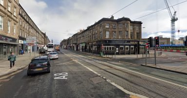 Woman struck by double decker bus fighting for life in hospital