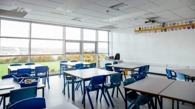 Stock image of an empty classroom.