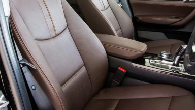 Man found slumped in stolen car with handgun and knife
