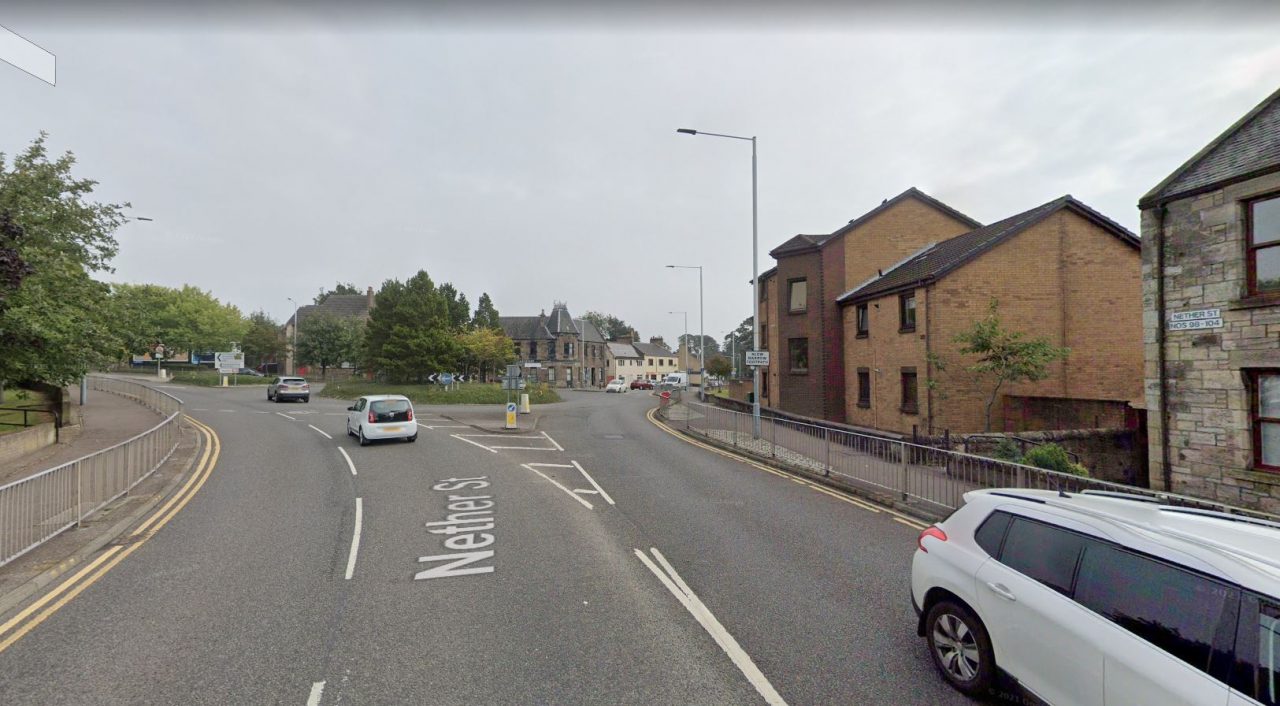 Man and woman in hospital after car crashes into trees at roundabout