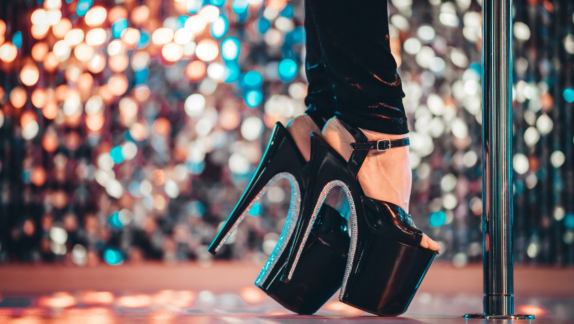 Stock image of stripper shoes and pole.
