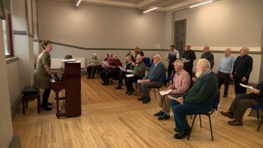 Choir of elderly fans sings way into football team’s heart