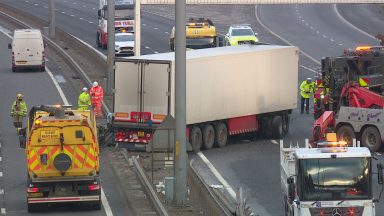Stretch of M8 closed in both directions as lorry crash shuts motorway