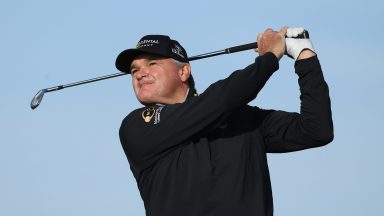 Former Open champion Paul Lawrie gets action under way at St Andrews