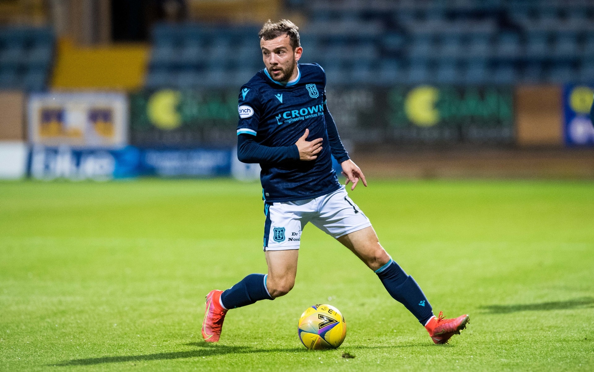 Paul McMullan stars for Dundee in the Scottish Premiership.